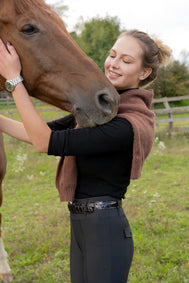Full-body view of rider in Classy Equestrians performance outfit